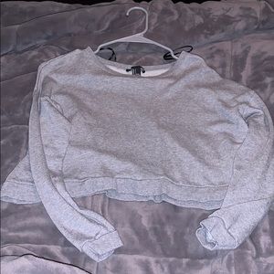 Cropped long sleeve sweater